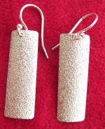Rolled convex earrings